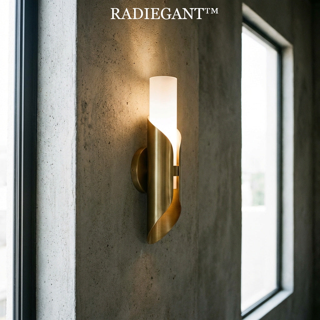 ◧ Radiegant™ THE AURELIAN TORCH SCONCE "Light is the only element that can soften stone. By wrapping a pillar of pure luminescence in a heavy cloak of forged brass, we create a beacon that commands the shadows of your architecture."