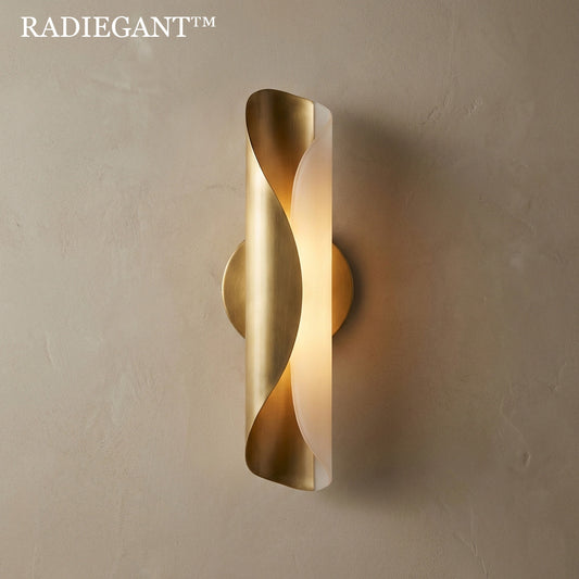 ◈Radiegant™ THE HELIX-FOLD BRASS SCONCE - "Illumination should never assault the senses. By folding brass around a core of frosted light, we create a fixture that breathes—emitting a soft, golden aura that feels alive."