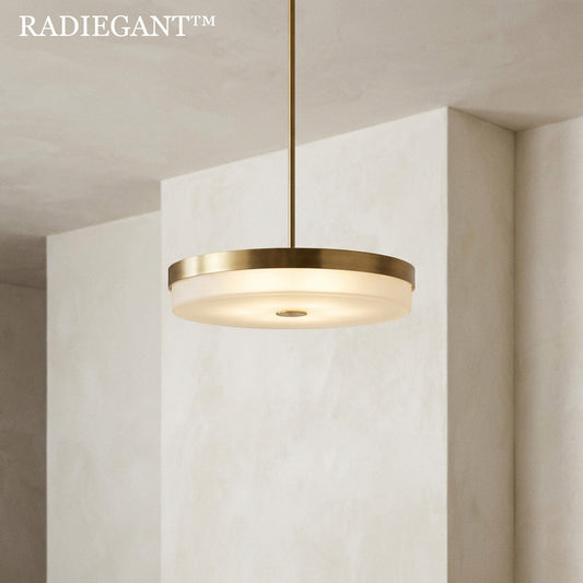 ⭕ Radiegant™ THE ZENITH HALO PENDANT "Atmosphere requires boundaries. By encapsulating a pure, cloud-like wash of light within a fortress of forged brass, we create an artificial horizon—a zenith of uninterrupted calm."
